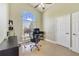 Inviting office space featuring a large window and ample room for productivity and organization at 2226 Lake Marion Dr, Apopka, FL 32712