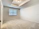 Spacious bedroom featuring a window, neutral walls, recessed lighting and neutral carpet at 12285 Joshua Tree Trl, Windermere, FL 34786