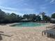 A large pool with a gazebo and lounge chairs provides a relaxing outdoor space for residents at 12285 Joshua Tree Trl, Windermere, FL 34786