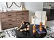 Modern decor in the living room, showcasing a wood dresser and stylish wooden candlesticks at 2097 Celebration Blvd, Celebration, FL 34747