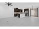 Bright, modern kitchen with stainless steel appliances, dark cabinets, and an expansive island at 2097 Celebration Blvd, Celebration, FL 34747