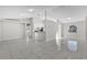 Bright and spacious living area with tile floors and high ceilings at 2102 Kingswood Ave, Deltona, FL 32725