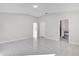 Spacious main bedroom with access to a bathroom at 2102 Kingswood Ave, Deltona, FL 32725