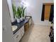 Bathroom with double vanity, large mirrors, and tile flooring at 3021 Norvell Ct, Deltona, FL 32738