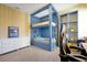 Bright bedroom featuring custom blue bunk beds and a built-in desk with ample shelving at 3359 Hanging Tide St, Winter Garden, FL 34787