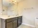 Bathroom featuring double sink vanity with tile floor at 5303 Wildwood Way, Davenport, FL 33837