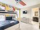 Whimsical bedroom featuring bunk beds and colorful decor at 5303 Wildwood Way, Davenport, FL 33837
