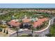 Exterior of the community center clubhouse and pool in a well-maintained residential neighborhood at 5303 Wildwood Way, Davenport, FL 33837