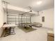 Spacious garage with ping pong table and comfortable seating at 5303 Wildwood Way, Davenport, FL 33837
