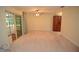 Large living area with sliding doors to the lanai offers seamless indoor-outdoor living at 306 Wild Olive Ln, Longwood, FL 32779