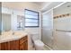 This bathroom features a shower, frosted windows, and a vanity sink at 1098 Park Dr, Casselberry, FL 32707