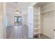 The bedroom features new laminate flooring, a ceiling fan, and a closet at 1098 Park Dr, Casselberry, FL 32707