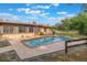 Inviting pool with spacious deck area and privacy fence for outdoor enjoyment at 1098 Park Dr, Casselberry, FL 32707