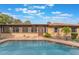 Inviting pool with spacious deck area, ideal for outdoor enjoyment and relaxation at 1098 Park Dr, Casselberry, FL 32707
