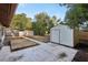 View of backyard, including shed and patio at 1748 Haverhill Dr, Deltona, FL 32725
