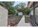 Backyard with shed, trees, and walkway at 1748 Haverhill Dr, Deltona, FL 32725