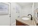 Updated bathroom with granite countertop and walk-in shower at 1748 Haverhill Dr, Deltona, FL 32725