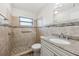 Accessible bathroom with walk-in shower and grab bars at 1748 Haverhill Dr, Deltona, FL 32725