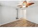 Spacious bedroom with ceiling fan and access to bathroom at 1748 Haverhill Dr, Deltona, FL 32725