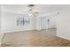 Bright living room featuring light wood flooring and sliding doors at 1748 Haverhill Dr, Deltona, FL 32725