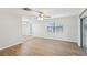 Light and airy living room with light wood flooring and ceiling fan at 1748 Haverhill Dr, Deltona, FL 32725