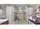 Large bathroom with a walk-in shower and glass enclosure at 405 Mallard Ln, Kissimmee, FL 34759