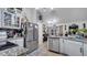 Bright kitchen featuring ample cabinet space and an island at 405 Mallard Ln, Kissimmee, FL 34759