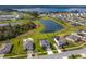 Aerial view showing the house's location in a lakefront community at 4150 Sunset Preserve Blvd, Orlando, FL 32820