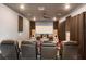 State-of-the-art home theater with comfortable seating and large screen at 4150 Sunset Preserve Blvd, Orlando, FL 32820