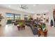 Spacious living room with large sectional sofa and view of lake at 4150 Sunset Preserve Blvd, Orlando, FL 32820