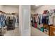 Large walk-in closet with ample shelving and hanging space at 4150 Sunset Preserve Blvd, Orlando, FL 32820