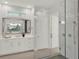 Beautiful bathroom showcasing a glass shower and marble countertops at 10852 Mobberley Cir, Orlando, FL 32832