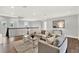 Cozy living room with comfortable seating, a coffee table, and natural light at 10852 Mobberley Cir, Orlando, FL 32832