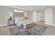 Comfortable main bedroom featuring a decorative rug, tufted headboard, and plenty of natural light at 10852 Mobberley Cir, Orlando, FL 32832