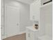 Functional mud room with built-in storage cabinets and a convenient bench at 10852 Mobberley Cir, Orlando, FL 32832