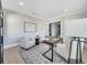 Well-lit office featuring a sleek desk, comfortable seating, and stylish decor for a professional workspace at 10852 Mobberley Cir, Orlando, FL 32832