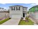 Beautiful two-story home featuring a two-car garage and well-maintained landscaping at 528 Carya Way, Auburndale, FL 33823