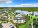 Community pool, clubhouse, and lakefront views at 8622 Dufferin Ln, Orlando, FL 32832