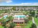 Aerial view of community pool and surrounding neighborhood at 8622 Dufferin Ln, Orlando, FL 32832