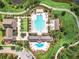 Community pool and clubhouse from an aerial perspective at 8622 Dufferin Ln, Orlando, FL 32832