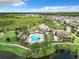 Aerial view of community pool and clubhouse at 8622 Dufferin Ln, Orlando, FL 32832