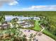 Community pool and clubhouse with lake views at 8622 Dufferin Ln, Orlando, FL 32832
