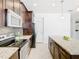 Modern kitchen with stainless steel appliances and granite countertops at 8622 Dufferin Ln, Orlando, FL 32832