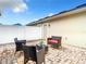 Private patio with wicker furniture at 8622 Dufferin Ln, Orlando, FL 32832