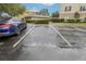 Designated parking spot with car beside building, showing convenience and accessibility for residents and visitors at 3725 Conroy Rd # 2131, Orlando, FL 32839