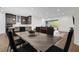 Open concept living area with an eat in kitchen area that features an oversized island and barstool seating at 13007 Bromborough Dr, Orlando, FL 32832