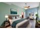 Serene bedroom with a tranquil color palette and plenty of natural light at 2731 Flintlock Ave, Clermont, FL 34711