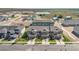 New townhome community featuring modern architecture, landscaping, and surrounding green spaces at 367 Sequoia Dr, Lake Wales, FL 33859
