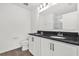 Modern bathroom features dual sinks, granite countertop, and sleek fixtures at 367 Sequoia Dr, Lake Wales, FL 33859
