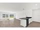 Bright living area featuring sleek floors, natural light, and modern design at 367 Sequoia Dr, Lake Wales, FL 33859